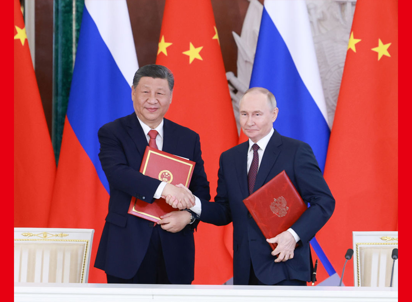 习近平同普京出席签字和合作文本交换仪式