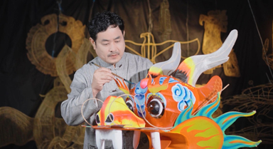 王永训:放飞“中华同心龙”